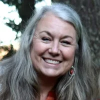 Customer of Willamette Craftworks smiling after a job well-done